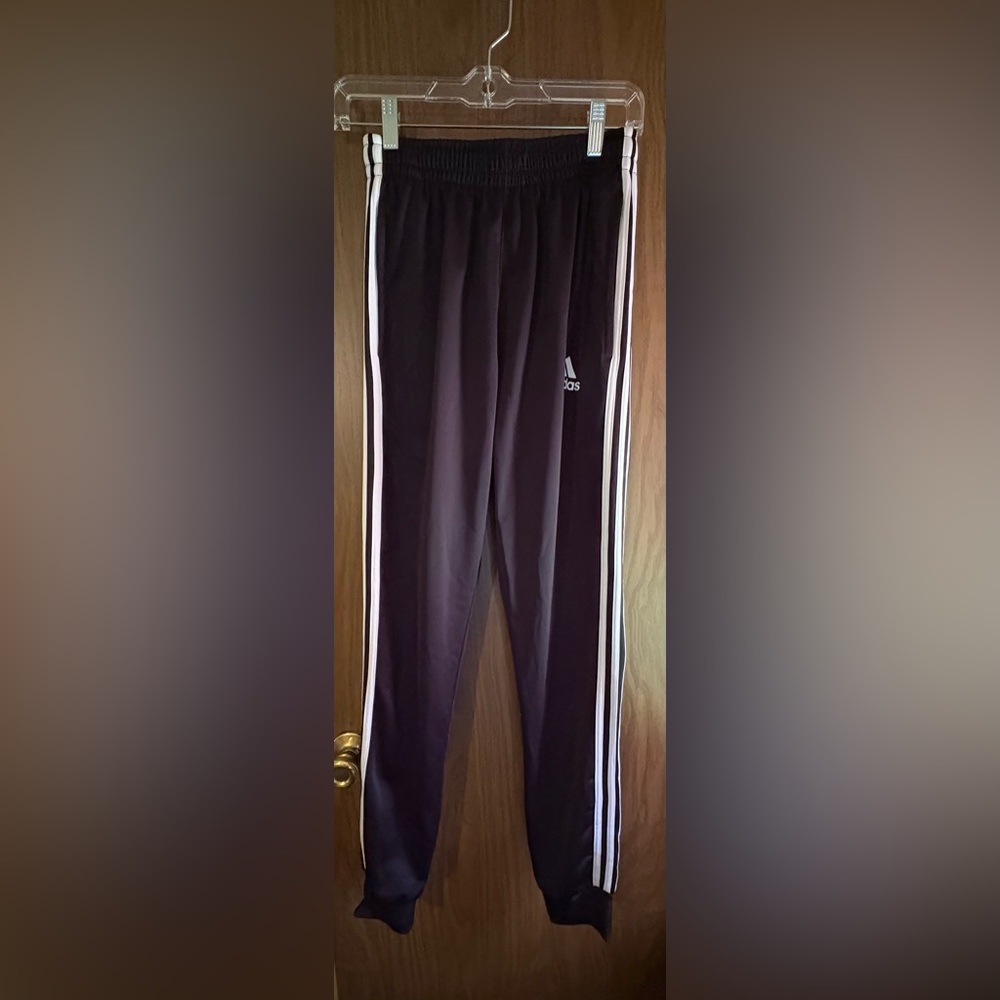 NWOT Adidas Men's Black Joggers with White Stripes in size medium.